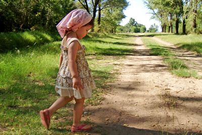 How web deign makes me feel. Like a small girl crossing a dirt road